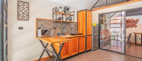 Fridge, toaster, dining tables