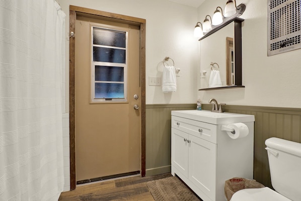 Hair dryer, towels, soap, toilet paper