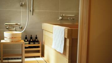 Shower, jetted tub, hair dryer, bidet