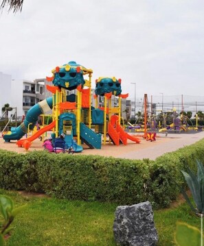 Children’s area - Modern 3-bedroom apartment Blanca Beach (sidi rahal)