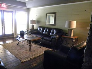 Suíte grand, vista para o lago | Área de estar