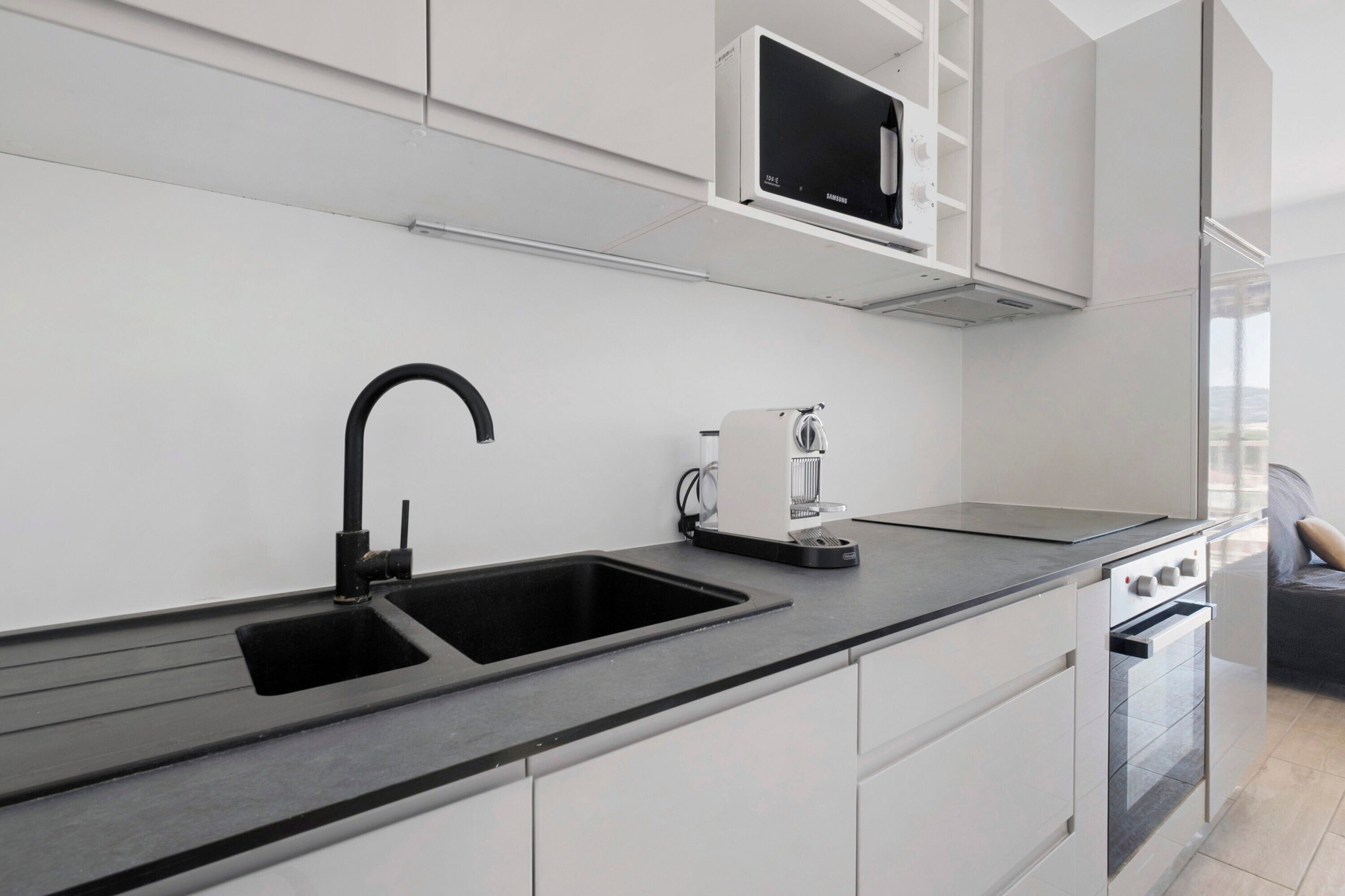 Fridge, microwave, stovetop, coffee/tea maker