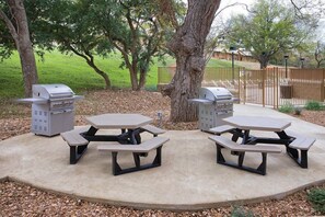 Outdoor dining - New Braunfels | Family River Escape | Pool + River | 3BR Sleeps 8 (New Braunfels)