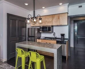 Fridge, microwave, stovetop, coffee/tea maker