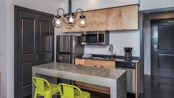 Fridge, microwave, stovetop, coffee/tea maker