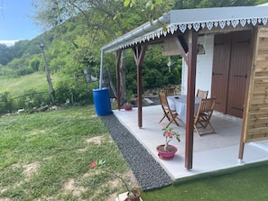 Outdoor dining - Lanmou 1 Vacation Rentals (1-Bedroom House) (La Désirade)