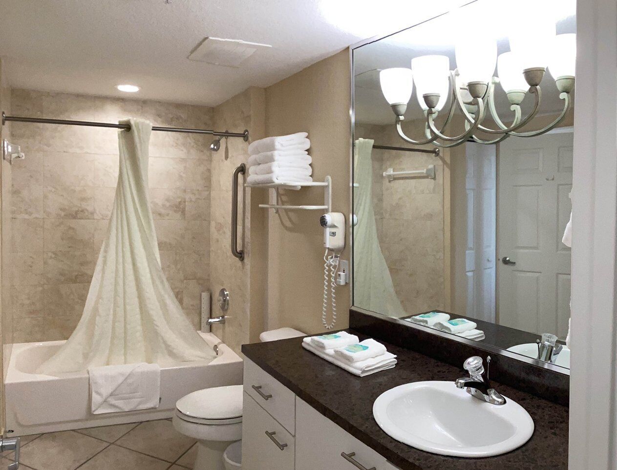 Hair dryer, towels, soap, shampoo