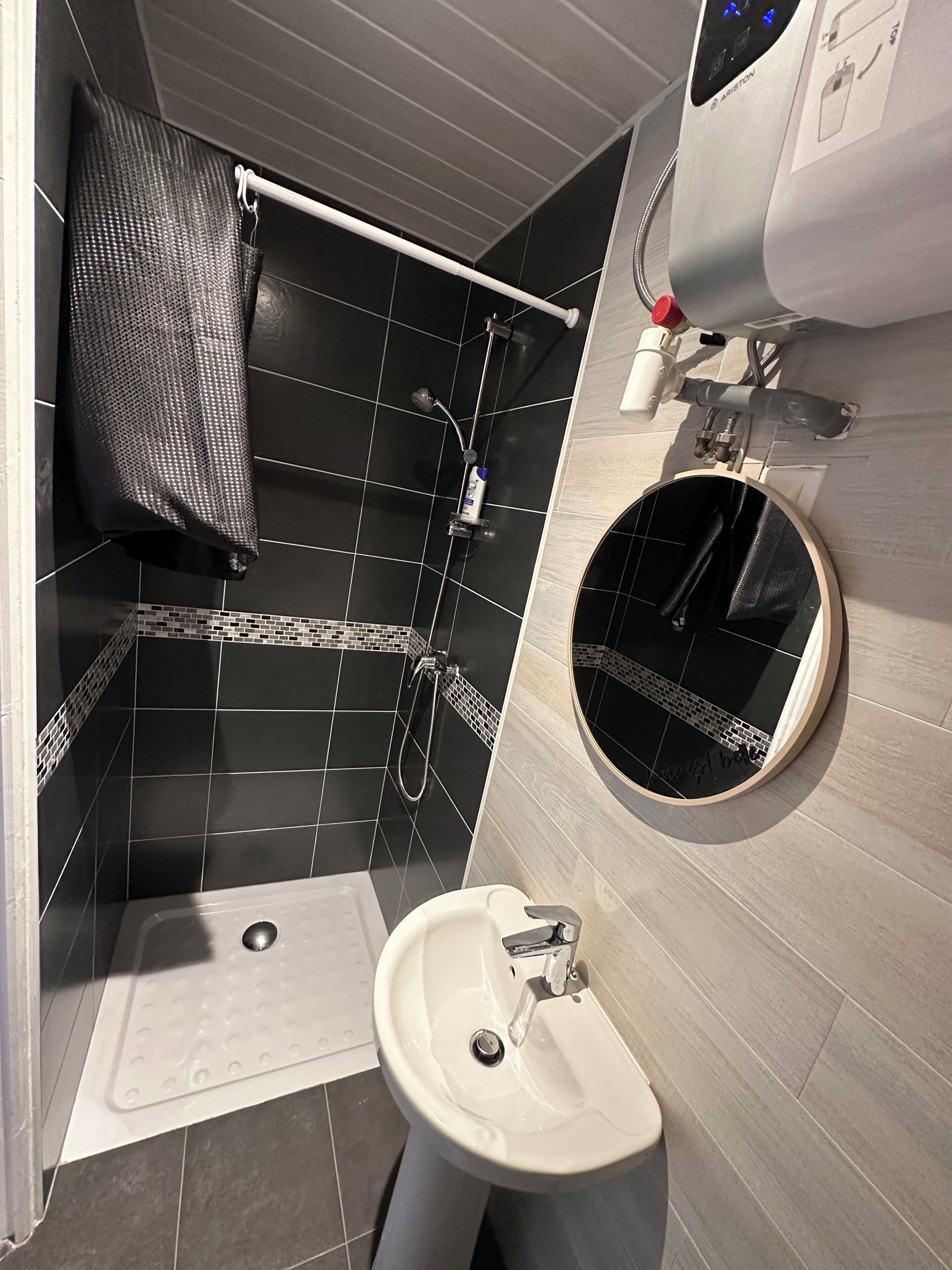 Shower, towels, soap, toilet paper