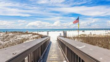 On the beach, sun-loungers, beach towels