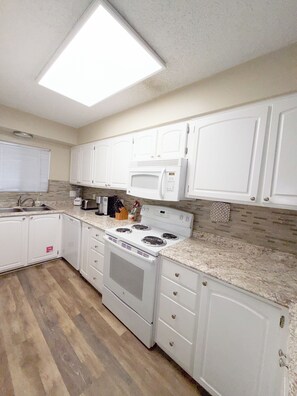 Private kitchen - OCEAN FRONT... Paradise Found!  Panoramic Gulf Views in the Heart of PCB (Panama City Beach)