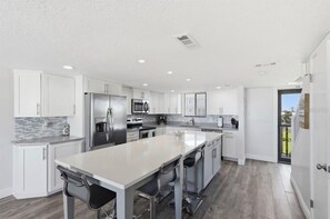 Private kitchen - OCEAN FRONT 2-bedroom condo with AC in Flagler Beach - Family and Pet Friendly! (Flagler Beach)