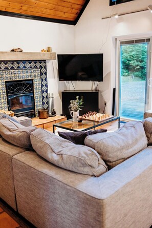 Living area - Catskill Forest A-Frame: Wood Fired Hot Tub, Sauna, Stars! (Stamford)