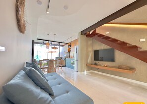 Apartemen Eksklusif | Area keluarga | TV layar datar