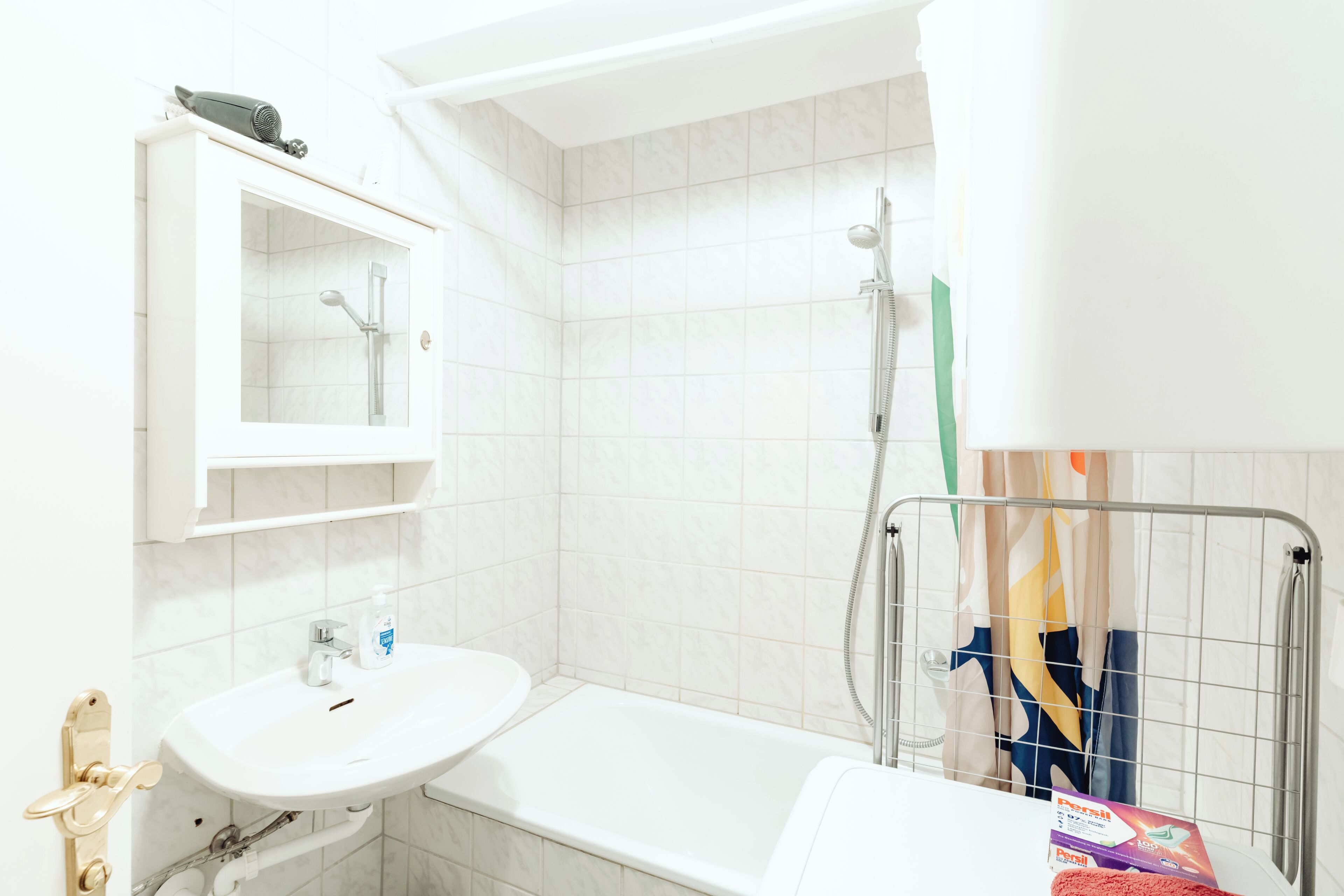 Hair dryer, towels, soap, toilet paper