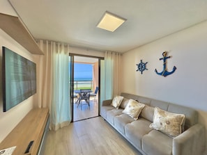 Comfort Apartment | Living area | TV