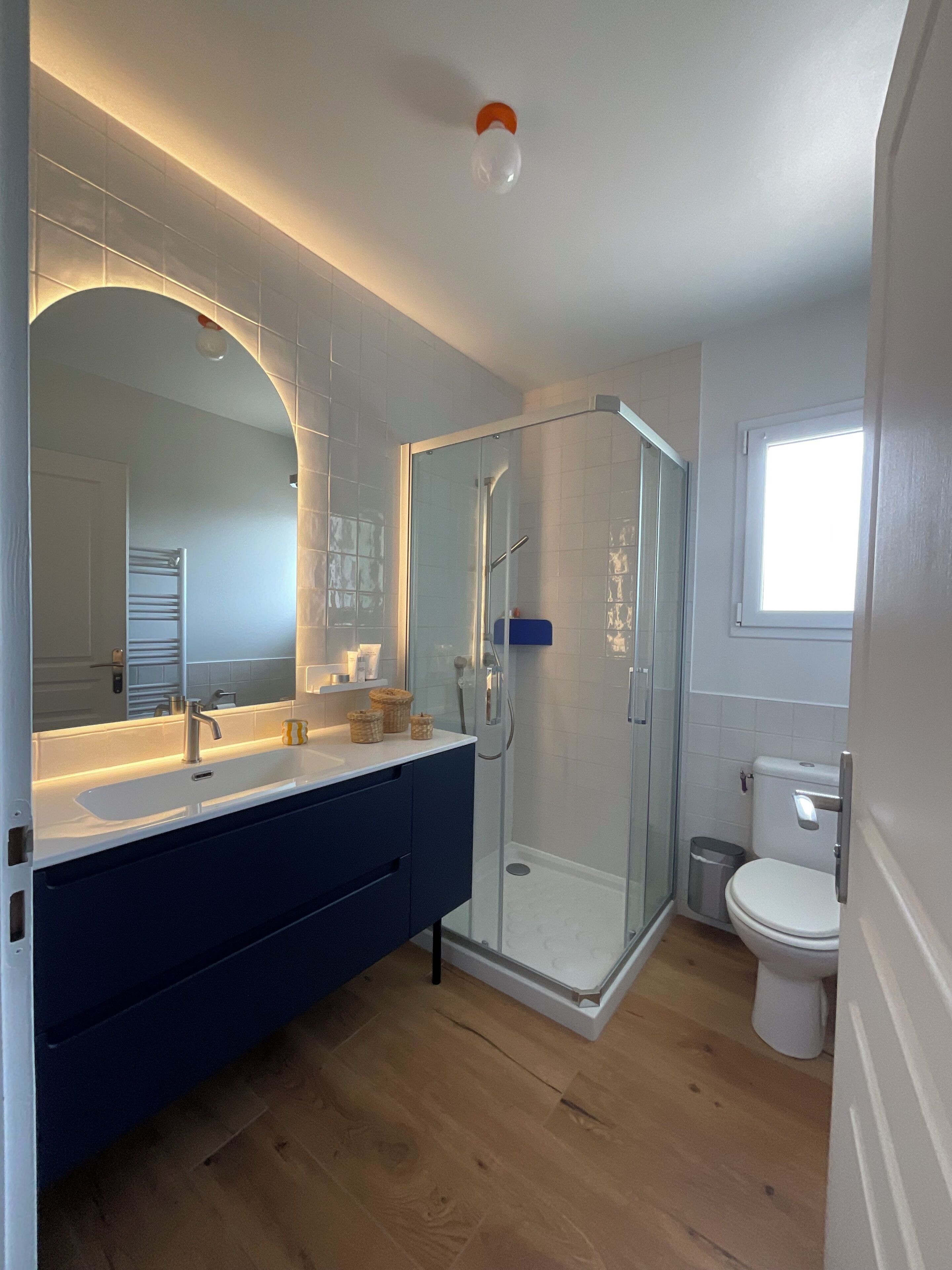 Shower, hair dryer, towels, toilet paper