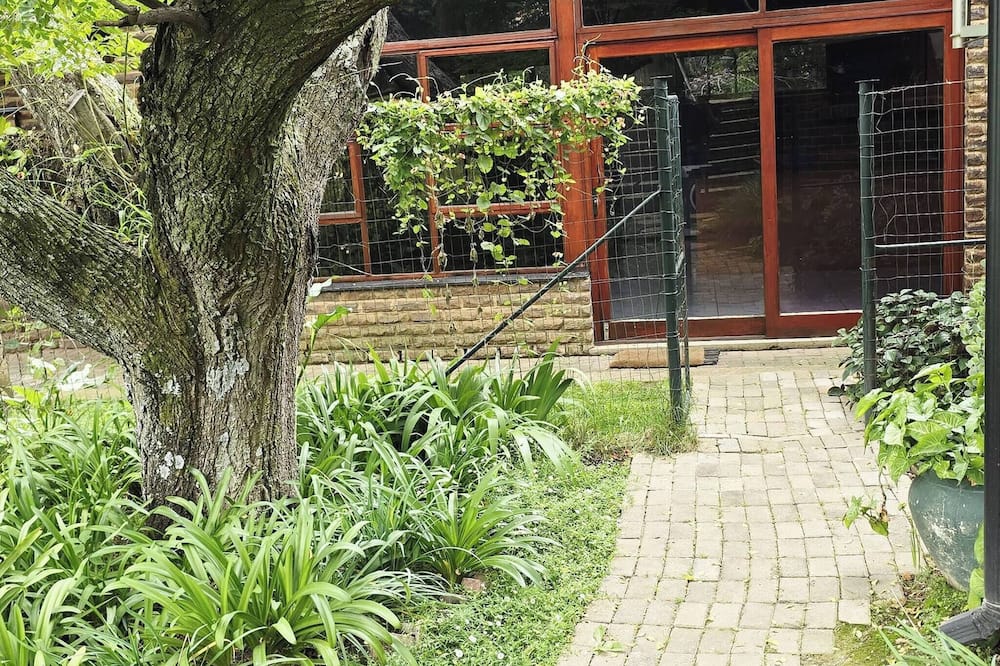 Serene 1-bedroom Apartment With Garden & Shared Pool