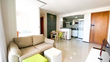 Apartamento básico | Área de estar | TV