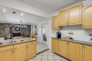 Microwave, oven, stovetop, dishwasher - Beachside Home w/ Private Patio Retreat (Daytona Beach)