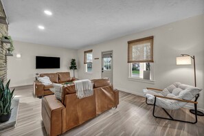 Living area - Bright 2BR w/ Sunroom Near Downtown & Beach (Euclid)