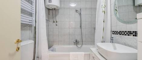 Hair dryer, towels, soap, toilet paper