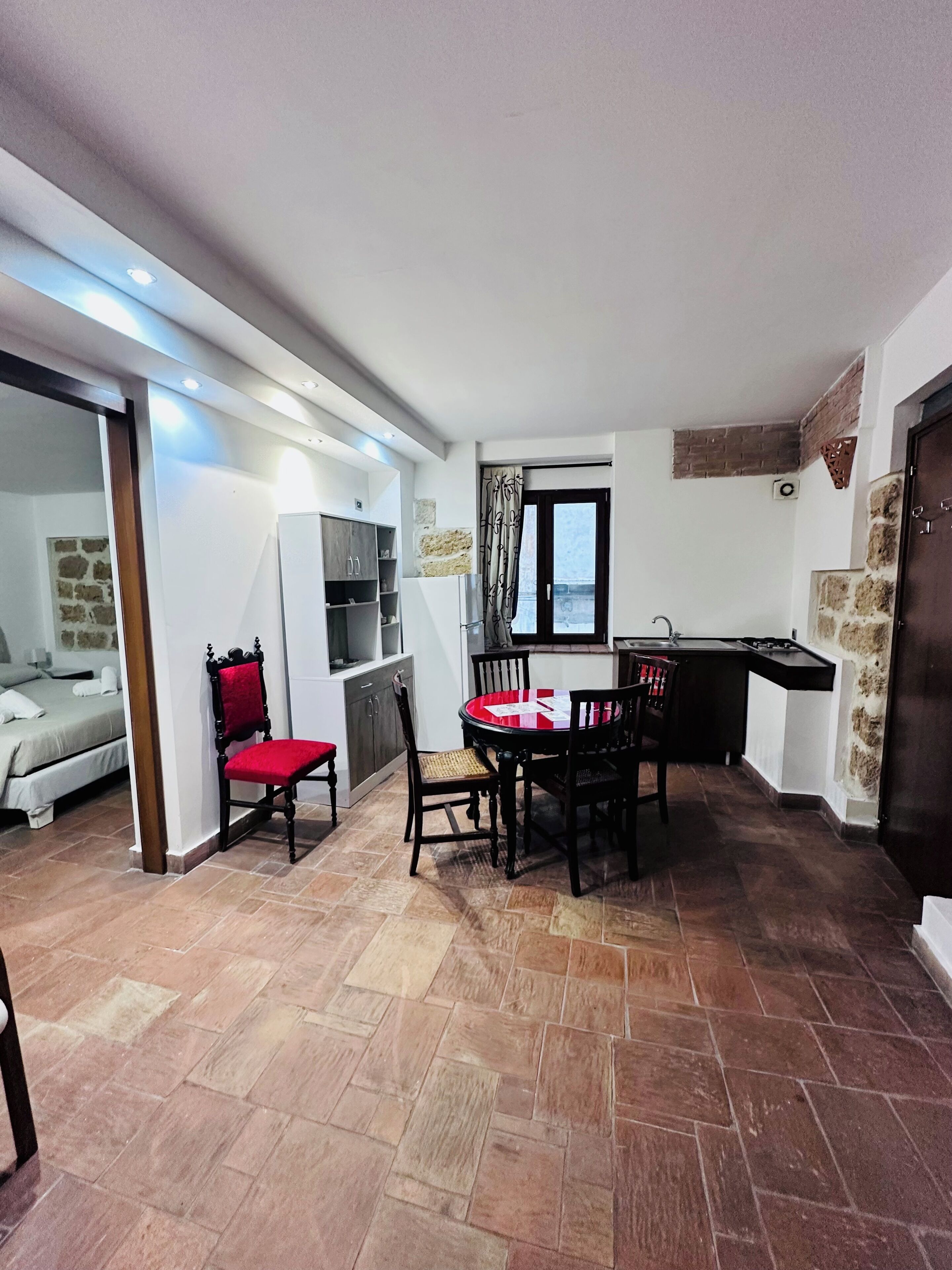 Family Quadruple Room, Private Bathroom | Living area