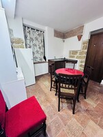 Family Quadruple Room, Private Bathroom | Dining