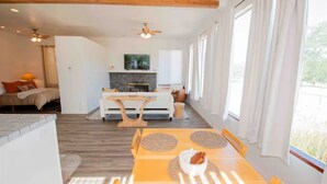 A modern interior with a dining area, kitchen, and living space. - Ojai’s Sage Ranch Guest Villa (Ojai)