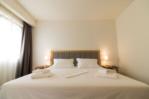 1 habitación, tabla de planchar con plancha, internet y ropa de cama 