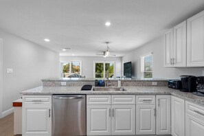 Fridge, microwave, stovetop, dishwasher - Modern Waterfront Tampa Home w/ Balconies (Tampa)
