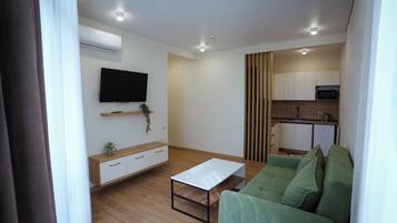 Luxury Apartment, 1 Bedroom, Partial Sea View | Living area