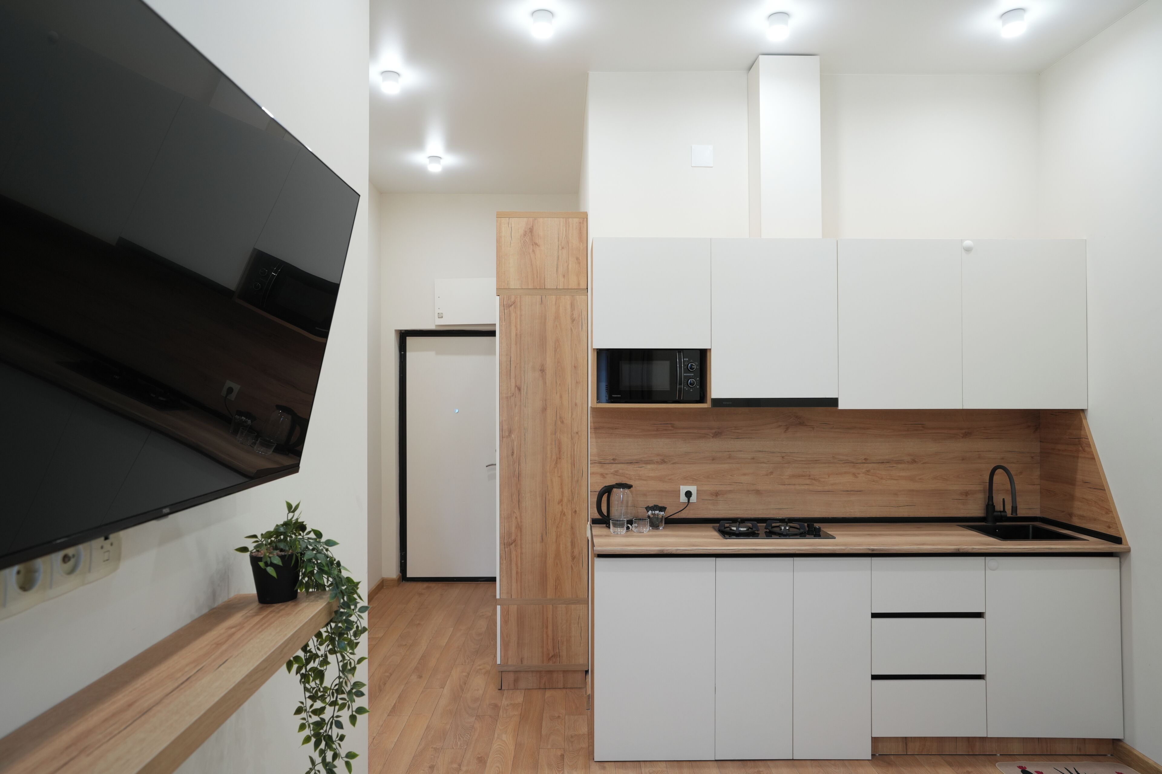 Appartamento Classic, vista montagna | Cucina privata | Mini-frigorifero, microonde, piano cottura, pentole/stoviglie/utensili