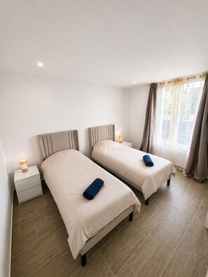 2 chambres, fer et planche à repasser, Wi-Fi, draps fournis