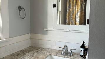 Hair dryer, towels, soap, toilet paper