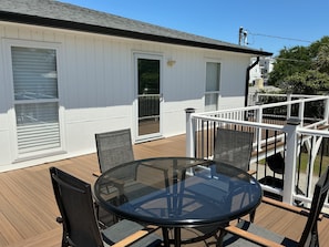 Outdoor dining - Newly remodeled 2 bedroom upstairs apartment with wraparound deck all new applia (Carolina Beach)