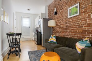 Living area - Stylish 1BR w Balcony & Laundry, Walk to PATH NYC (Hoboken)