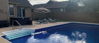 Loaded 4-bedroom house with pool, hot tub, and game room in charming Wichita