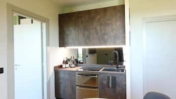 Appartamento Deluxe, balcone, vista città | Cucina privata