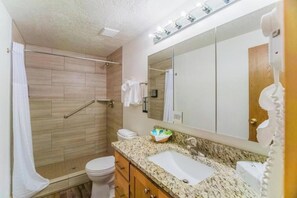 Hair dryer, towels, soap, toilet paper