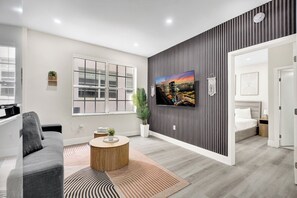 Standard 2 Bedroom Suite | Living area | 45-inch Smart TV with cable channels