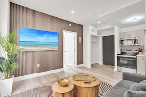 Modern 1BDR/1BA Apartment 310 | Living area | 45-inch Smart TV with cable channels - SoBe Suites 727 (Miami Beach)