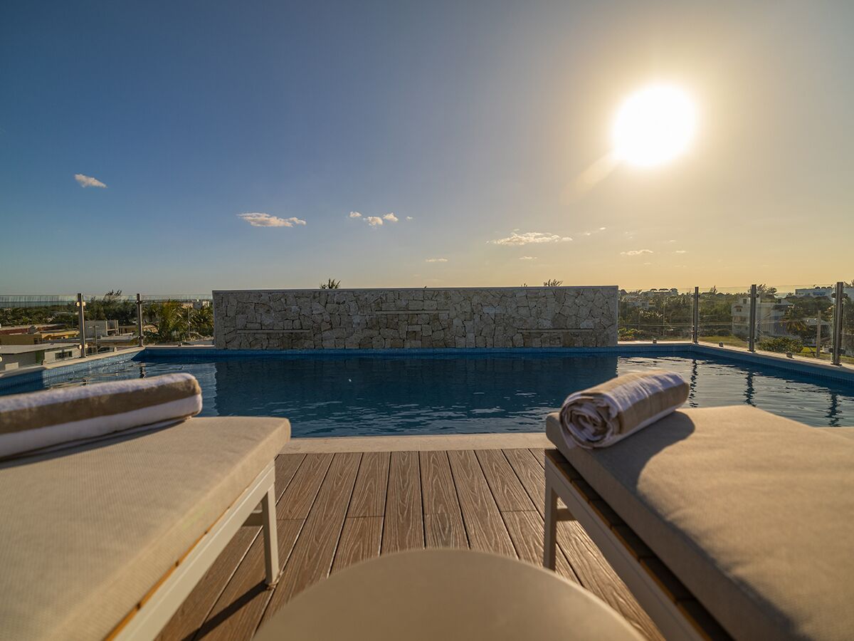 Outdoor pool, pool umbrellas, pool loungers