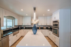 Microwave, oven, stovetop, dishwasher - Peoria Resort! Spacious 7BR, Heated Pool, Theater, Hot Tub, Ping Pong & More! (Peoria)