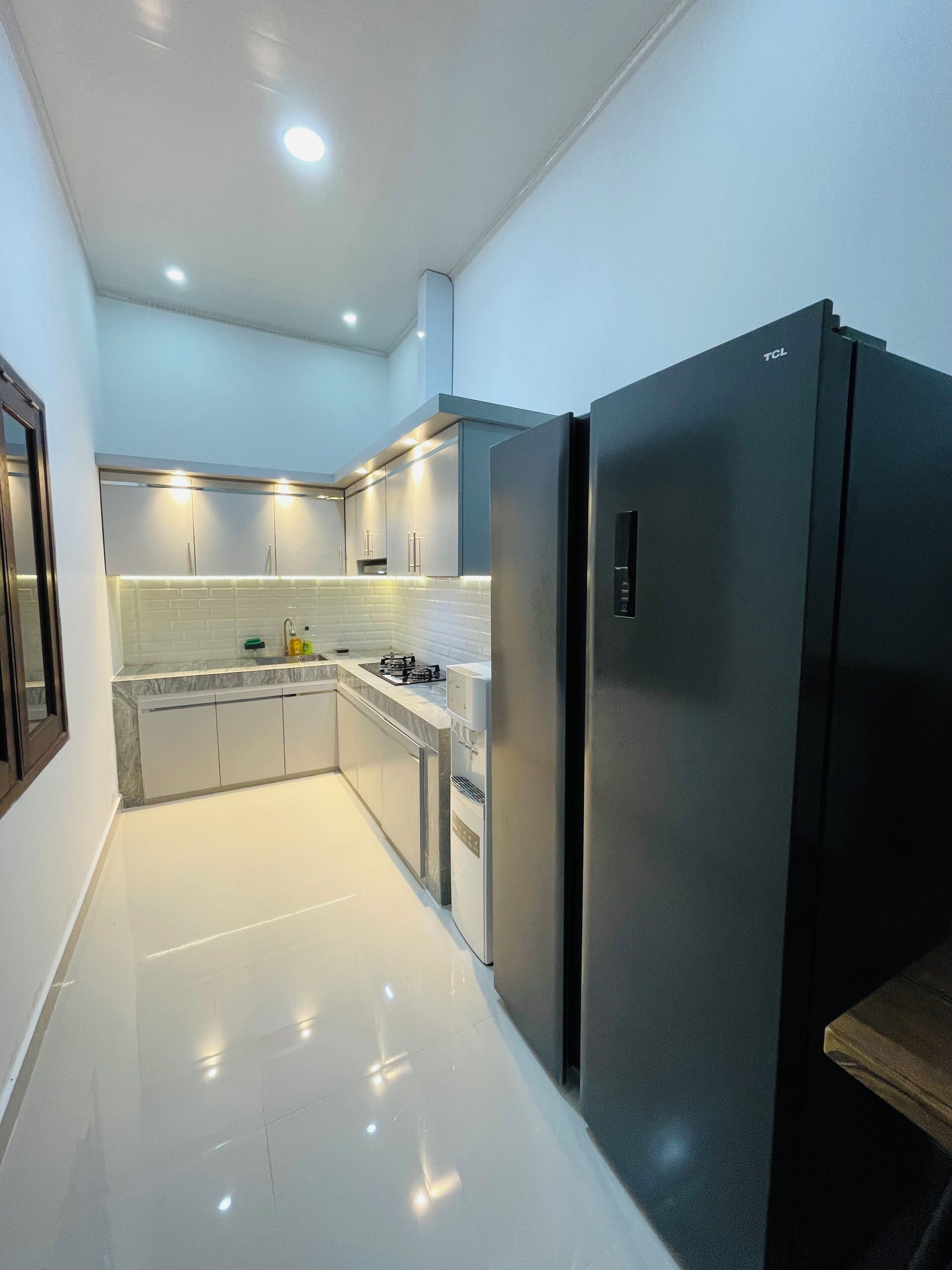 Comfort House, Patio, Beach View | Private kitchen | Shared fridge, microwave, electric kettle, highchair