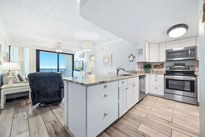 Fridge, microwave, oven, stovetop - Island Sunrise 667 | Beachfront | Pool | Low-Density | Heart of Gulf Shores | My Beach Getaways (Gulf Shores)