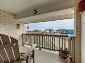 Terrace/patio - Relax at Coral Cay #214, a spacious 2BR condo in Port Aransas, near the beach. (Port Aransas)