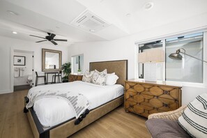 Tabla de planchar con plancha, wifi gratis y ropa de cama 
