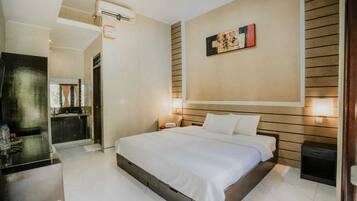 Deluxe Double Room, Pool View | Desk, laptop workspace, free WiFi
