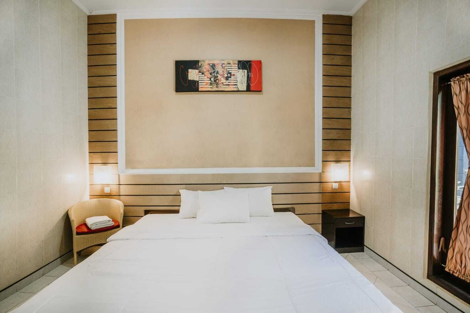 Deluxe Double Room, Pool View | Desk, laptop workspace, free WiFi