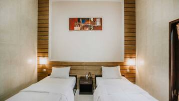 Deluxe Double Room, Pool View | Desk, laptop workspace, free WiFi